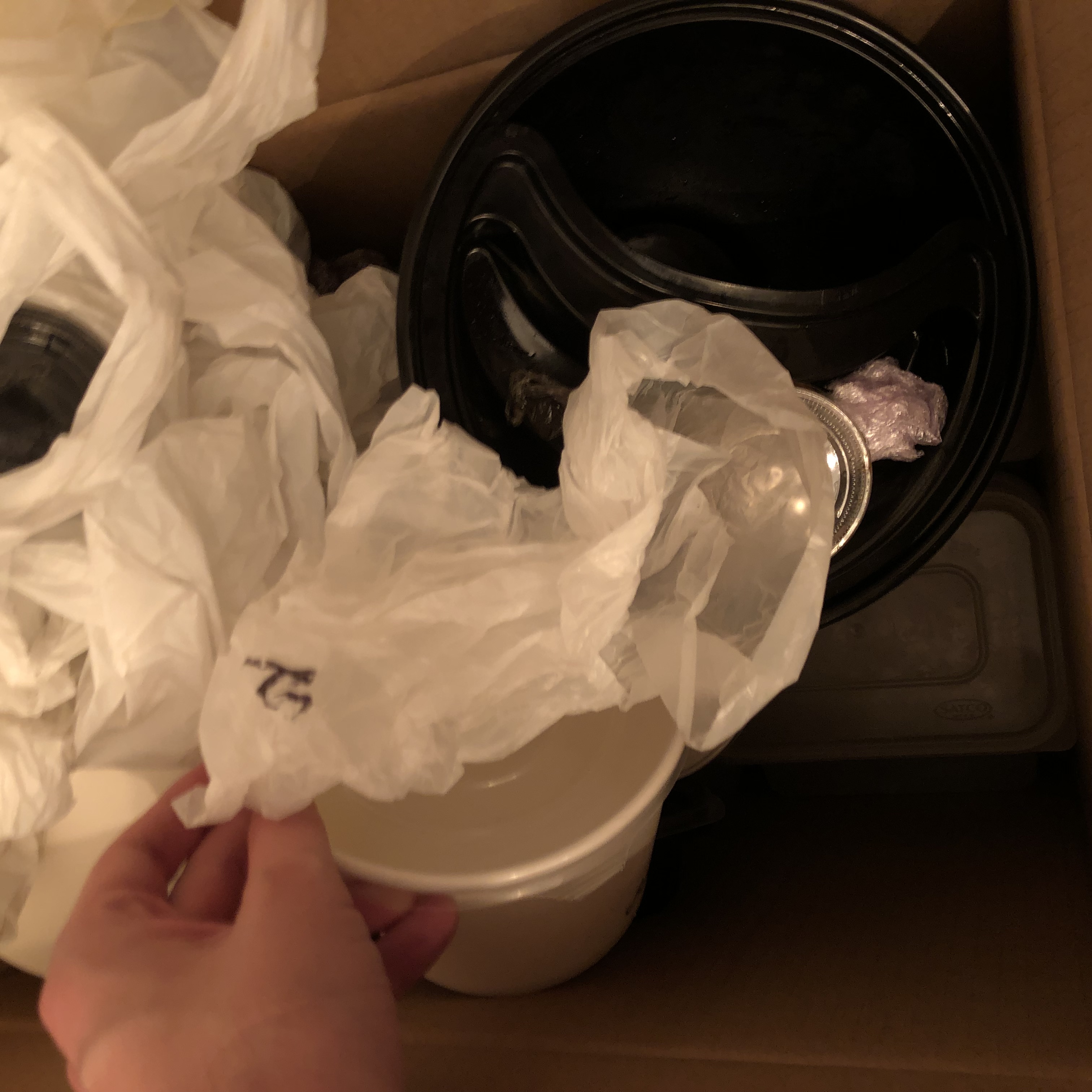 Close up of the plastics in a cardboard box